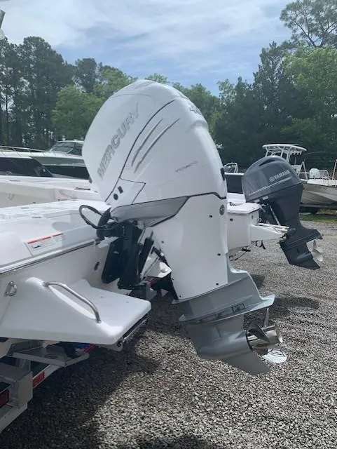 Slide: The Image of 2021 Everglades 253 Center Console boat with Mercury outboard engines. - 3