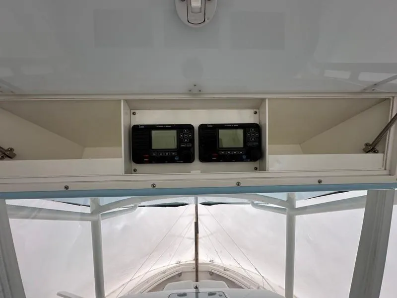 Slide: The Image of 2016 Regulator 41 boat interior with dual marine radios. - 21