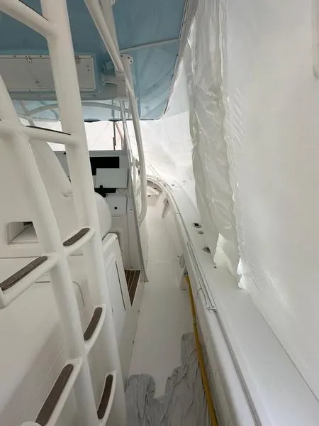 Slide: The Image of 2016 Regulator 41 boat interior with white and blue accents. - 26