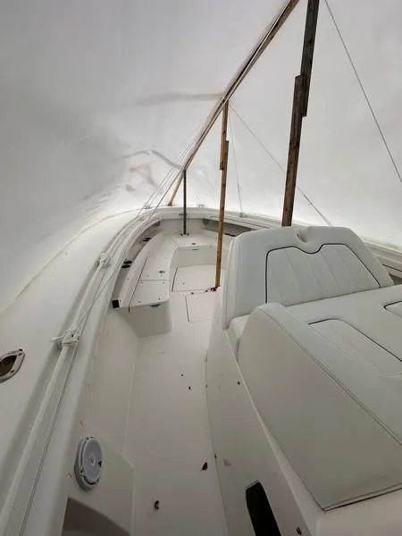 Slide: The Image of 2016 Regulator 41 boat interior under protective cover. - 28