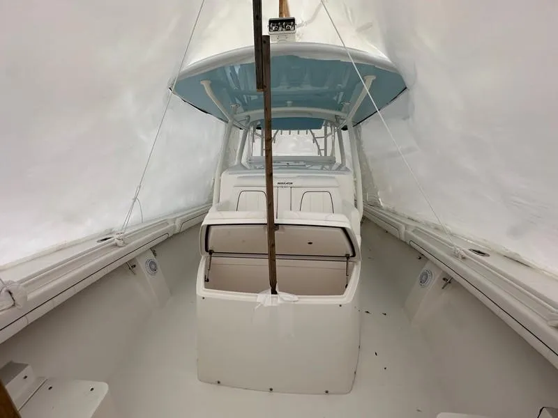 Slide: The Image of 2016 Regulator 41 boat interior under protective cover. - 32