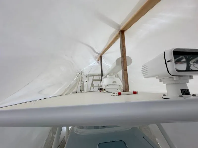 Slide: The Image of 2016 Regulator 41 boat under protective cover, interior view. - 33