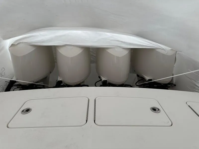 Slide: The Image of 2016 Regulator 41 boat engines covered in protective wrap. - 40