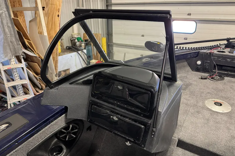 Slide: The Image of 2025 Tracker TARGA V18WT boat interior with dashboard and speaker. - 12
