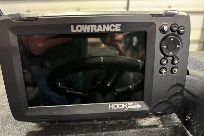 Slide: The Image of Lowrance Hook Reveal fish finder on 2025 Tracker TARGA V18WT boat dashboard. - 13