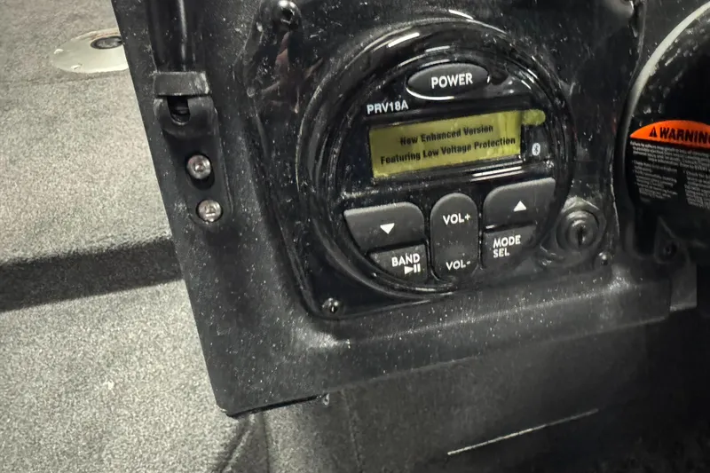 Slide: The Image of Control panel of 2025 Tracker TARGA V18WT boat with enhanced features. - 14