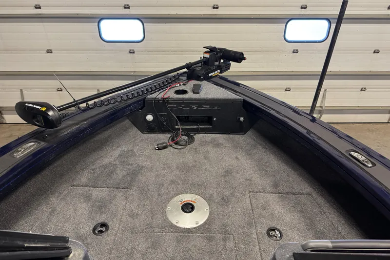 Slide: The Image of 2025 Tracker TARGA V18WT boat interior with mounted trolling motor. - 9