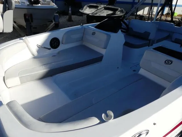 Slide: The Image of 2022 Hurricane SunDeck Sport 185 OB interior, featuring spacious seating and modern design. - 11