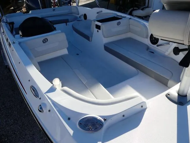 Slide: The Image of 2022 Hurricane SunDeck Sport 185 OB boat interior, featuring spacious seating and modern design. - 12