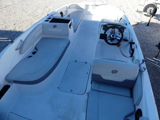 Slide: The Image of 2022 Hurricane SunDeck Sport 185 OB boat interior with steering wheel and seating. - 14