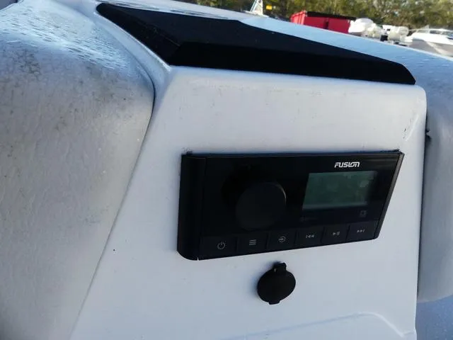 Slide: The Image of 2022 Hurricane SunDeck Sport 185 OB boat dashboard with Fusion stereo system. - 20