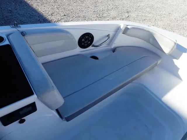 Slide: The Image of 2022 Hurricane SunDeck Sport 185 OB boat interior with seating and speaker. - 21