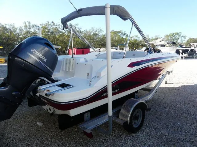 Slide: The Image of 2022 Hurricane SunDeck Sport 185 OB boat with Yamaha outboard motor on trailer. - 7