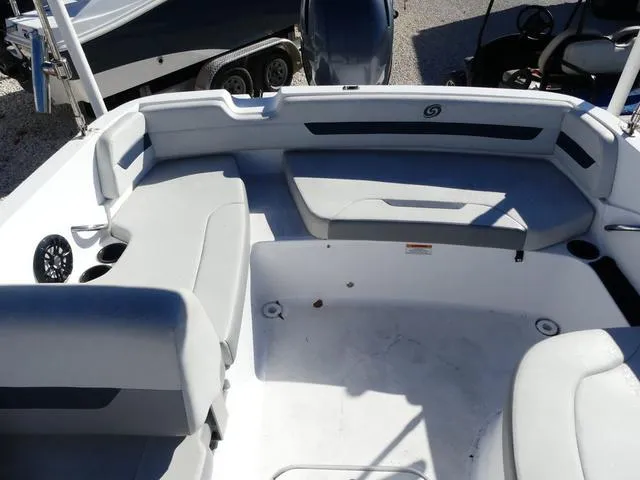 Slide: The Image of 2021 Hurricane SunDeck Sport 185 OB boat interior with spacious seating and cup holders. - 13