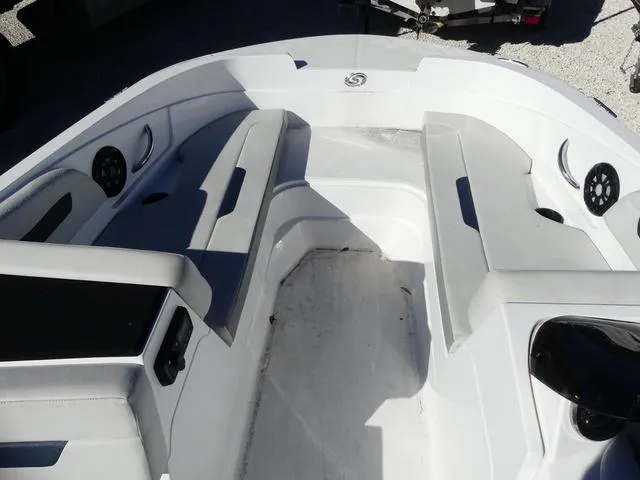 Slide: The Image of 2021 Hurricane SunDeck Sport 185 OB boat interior with seating and speakers. - 15