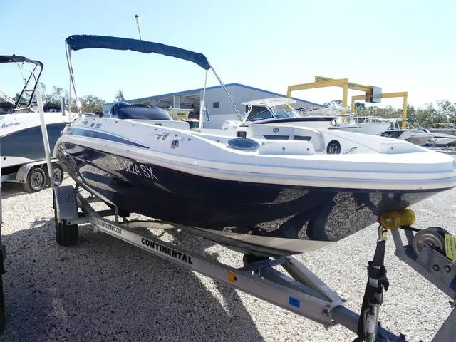 Slide: The Image of 2021 Hurricane SunDeck Sport 185 OB boat on trailer, outdoor display. - 3