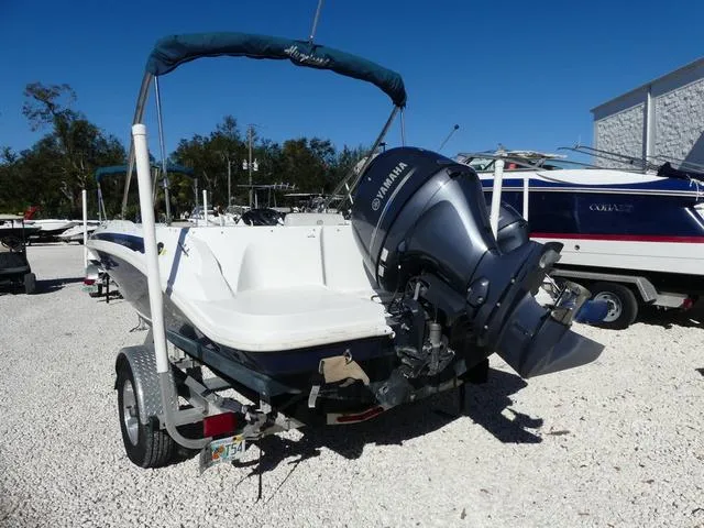 Slide: The Image of 2021 Hurricane SunDeck Sport 185 OB boat with Yamaha outboard motor on trailer. - 5