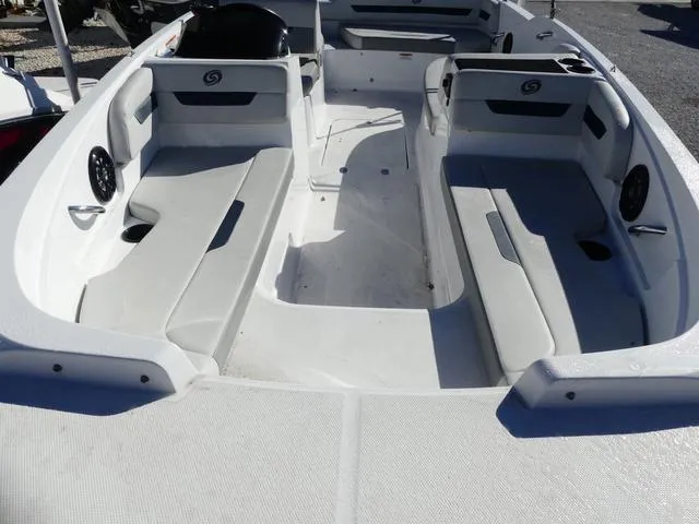 Slide: The Image of 2021 Hurricane SunDeck Sport 185 OB boat interior with spacious seating and modern design. - 9