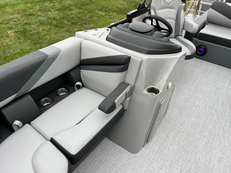 Slide: The Image of 2025 South Bay S222 UL boat interior with modern seating and steering console. - 10