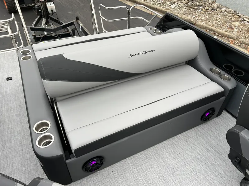 Slide: The Image of 2025 South Bay S222 UL boat seating with cup holders and modern design. - 12