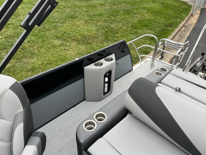 Slide: The Image of 2025 South Bay S222 UL boat interior with cup holders and seating. - 13