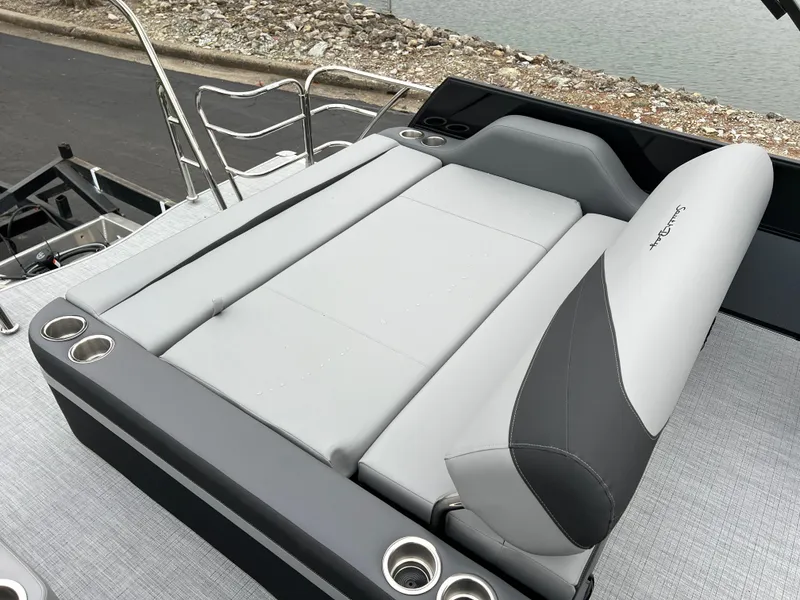 Slide: The Image of 2025 South Bay S222 UL boat with sleek seating and cup holders. - 14