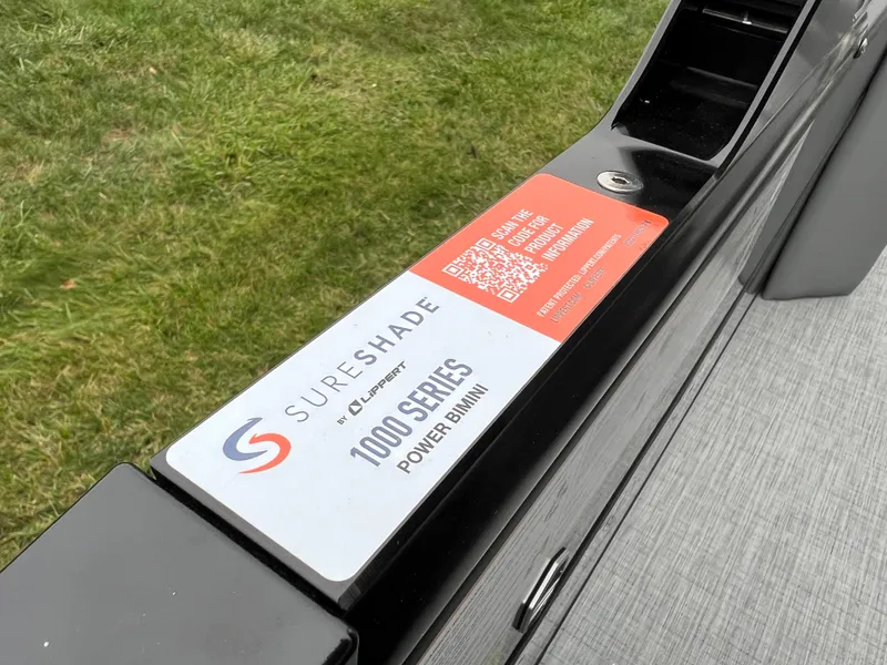 Slide: The Image of SureShade 1000 Series Power Bimini label on 2025 South Bay S222 UL boat. - 23