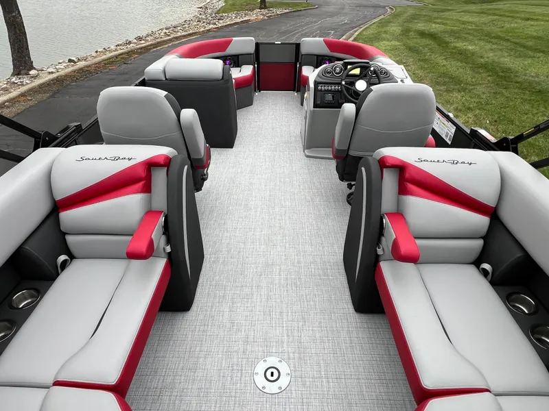Slide: The Image of 2025 South Bay S222 RS Tri 3.0 pontoon boat with stylish red and gray seating. - 14