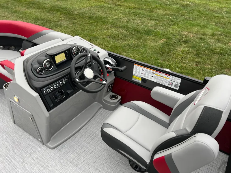 Slide: The Image of 2025 South Bay S222 RS Tri 3.0 boat interior with modern helm and seating. - 15