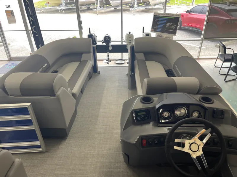 Slide: The Image of 2024 Bennington 188SVLSR pontoon boat interior with steering console and seating. - 31
