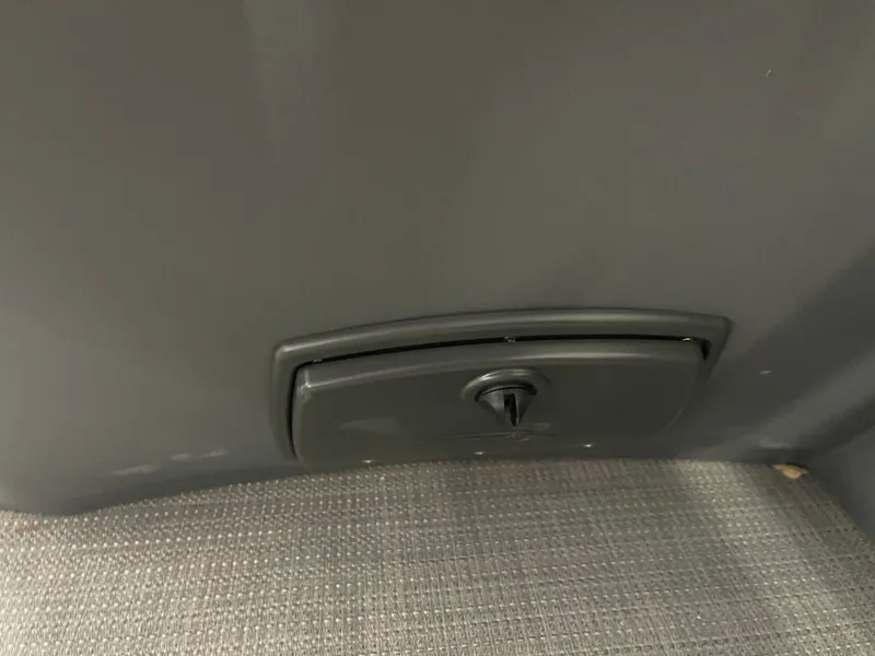 Slide: The Image of 2024 Bennington 188SVLSR interior detail with storage compartment and textured flooring. - 45