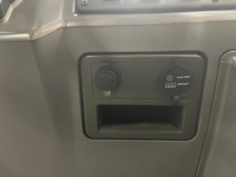 Slide: The Image of 2024 Bennington 188SVLSR dashboard with 12V, audio, and USB inputs. - 49