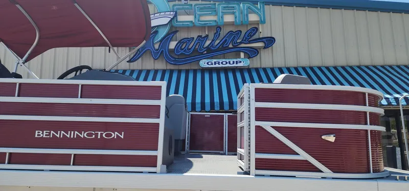 Slide: The Image of 2024 Bennington 20SVFSR pontoon boat displayed at Ocean Marine Group. - 10