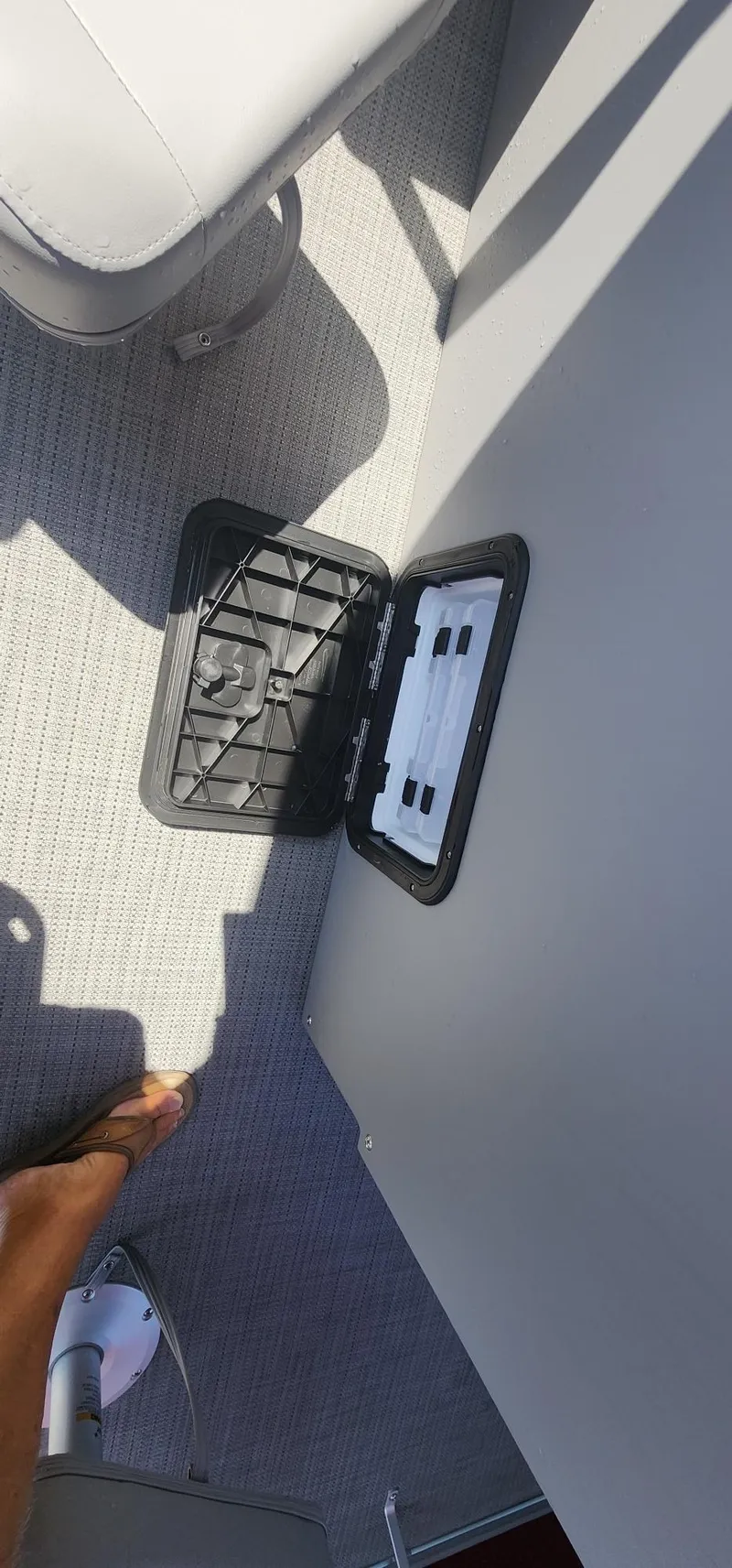 Slide: The Image of Open storage compartment on 2024 Bennington 20SVFSR boat interior. - 17