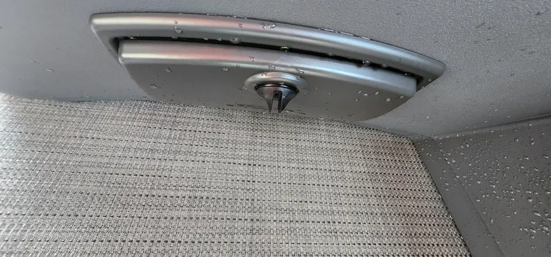 Slide: The Image of 2024 Bennington 20SVFSR boat interior detail with water droplets. - 22