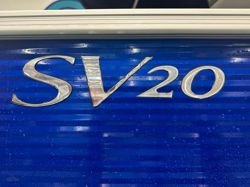 Slide: The Image of 2024 Bennington 20SVLSR boat emblem on blue background. - 11