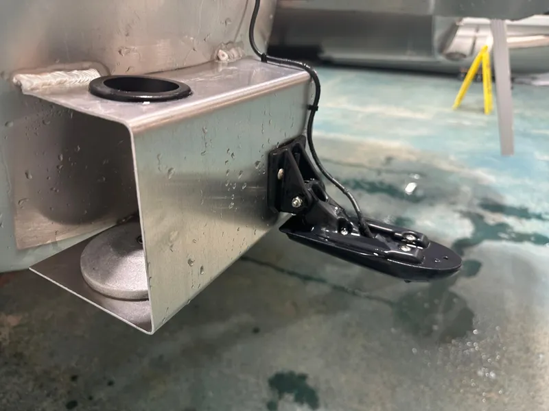 Slide: The Image of 2024 Bennington 20SVLSR boat transducer mount with water droplets. - 16