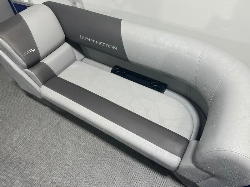 Slide: The Image of 2024 Bennington 20SVLSR boat seat with gray upholstery and logo detail. - 22