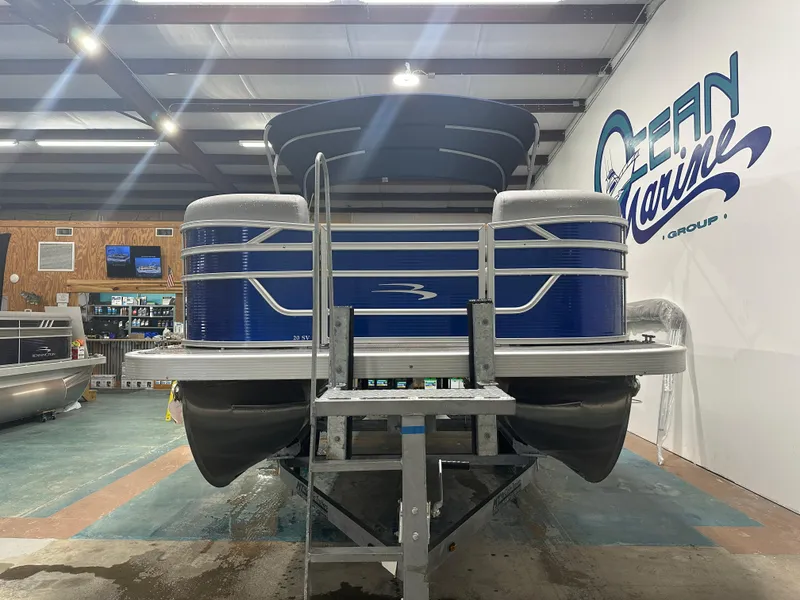 Slide: The Image of 2024 Bennington 20SVLSR pontoon boat in showroom, Ocean Marine Group. - 3