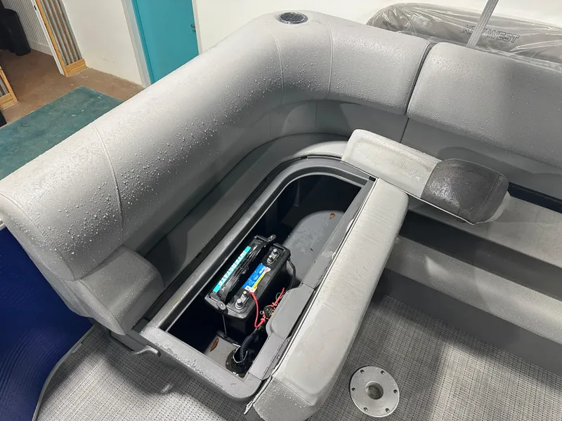 Slide: The Image of 2024 Bennington 20SVLSR boat seat storage with battery compartment. - 39