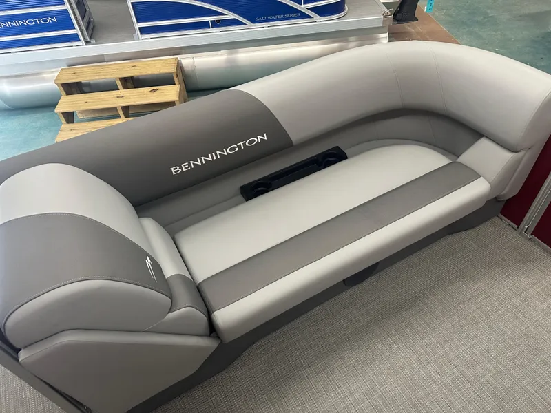 Slide: The Image of 2024 Bennington 20SVLSR boat seating, gray upholstery, showroom display. - 11