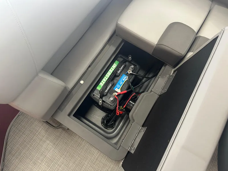 Slide: The Image of 2024 Bennington 20SVLSR boat battery compartment under seat. - 28