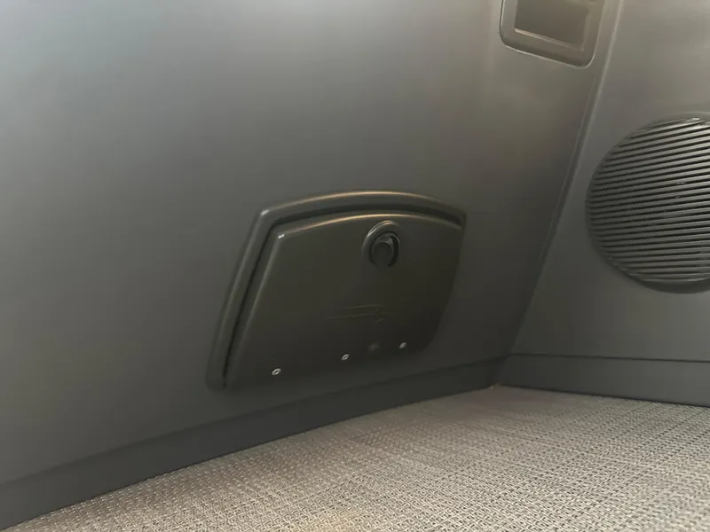 Slide: The Image of 2024 Bennington 20SVLSR interior panel with speaker and control knob. - 35