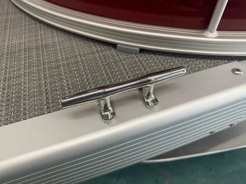 Slide: The Image of 2024 Bennington 20SVLSR boat cleat on textured deck surface. - 39