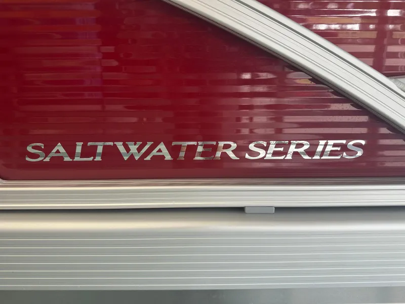 Slide: The Image of 2024 Bennington 20SVLSR Saltwater Series boat, red exterior detail. - 42