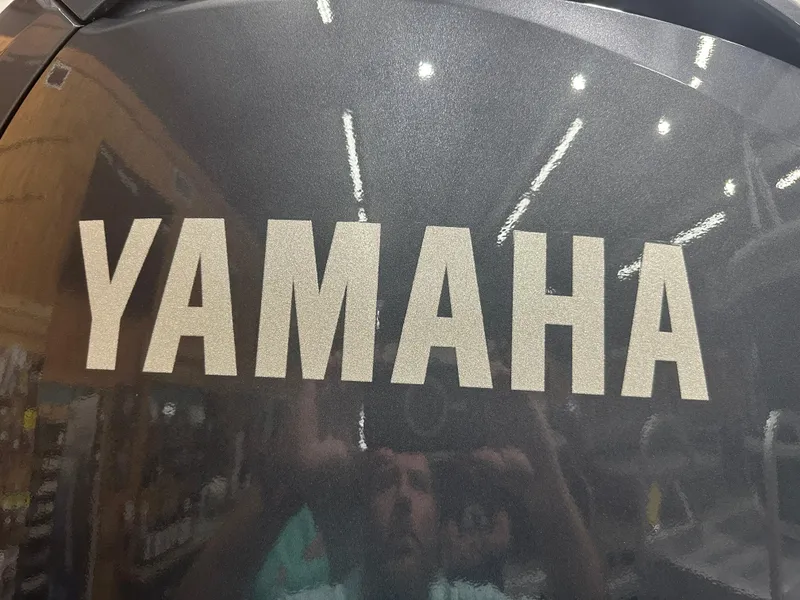 Slide: The Image of Close-up of Yamaha logo on a 2025 Bennington 22SSRSE boat. - 10