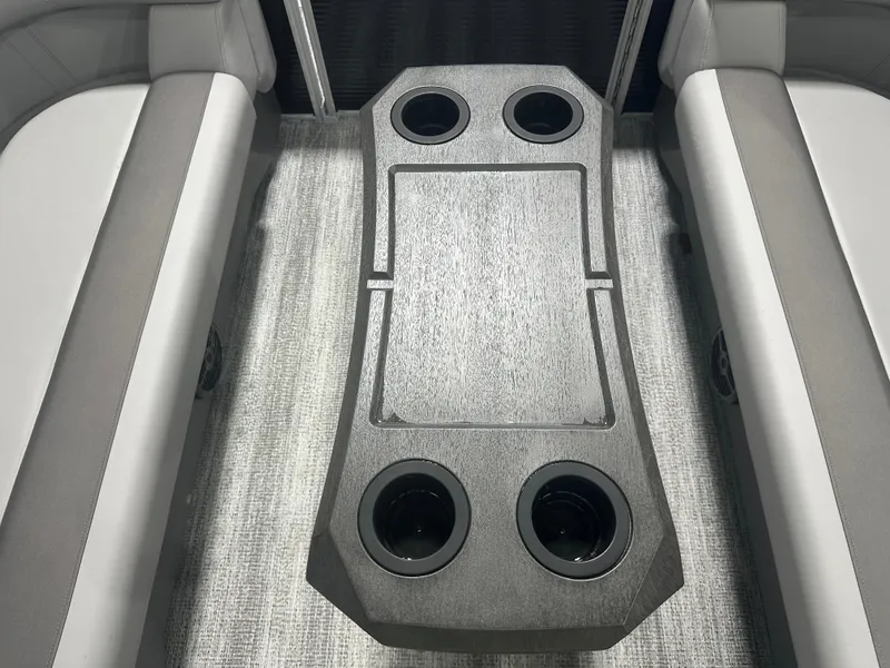 Slide: The Image of Interior of 2025 Bennington 22SSRSE boat with cup holders and seating. - 18