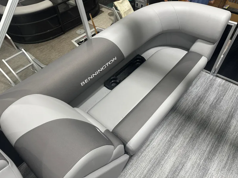 Slide: The Image of 2025 Bennington 22SSRSE boat interior with gray seating and modern design. - 19