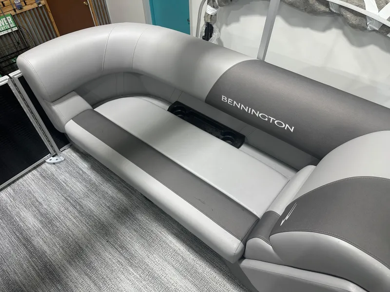 Slide: The Image of 2025 Bennington 22SSRSE boat interior seating, gray upholstery, modern design. - 21