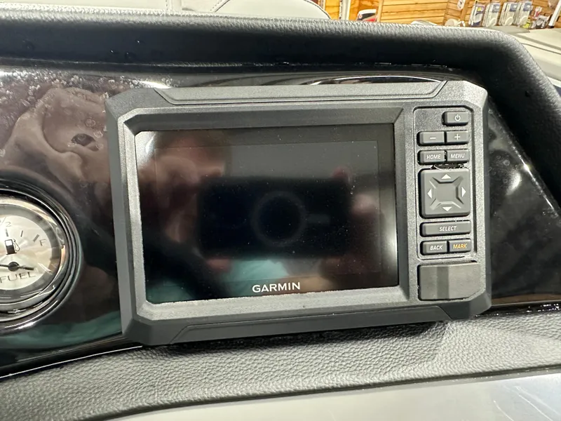 Slide: The Image of Garmin display on 2025 Bennington 22SSRSE boat dashboard with fuel gauge. - 27